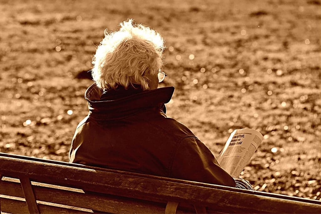 Older man sitting on bench