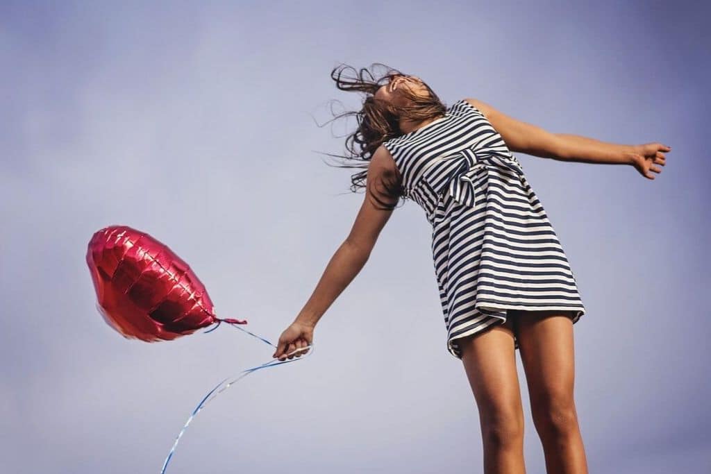 happy lady with balloon