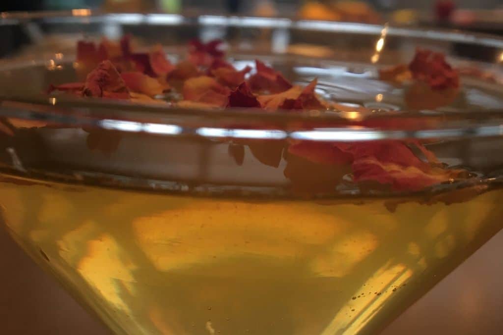 close up drink with rose petals
