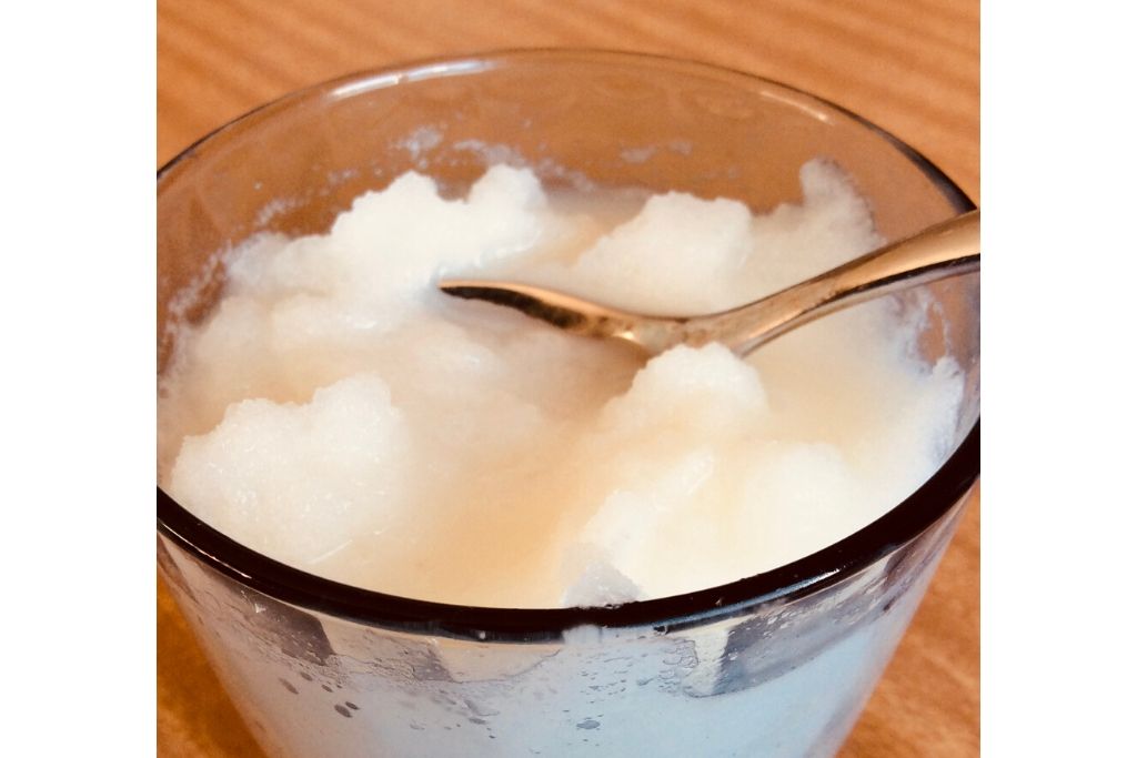 close up frozen white slushie drink