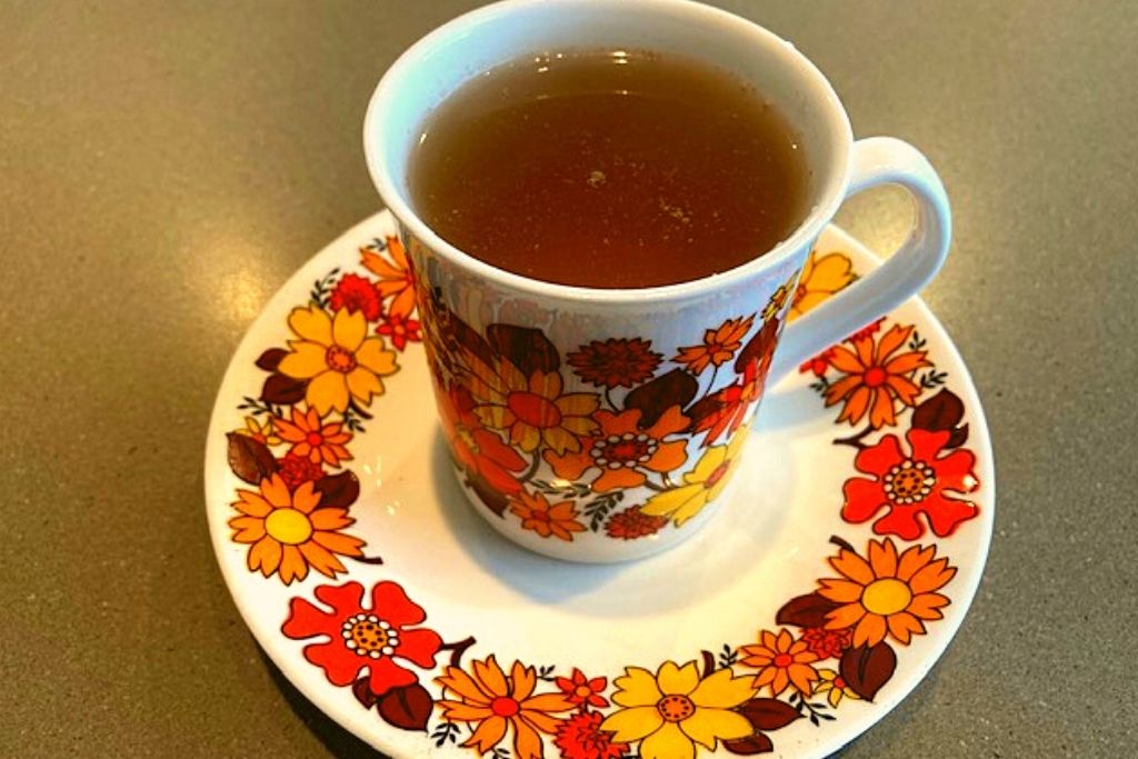 tea in delicate floral teacup