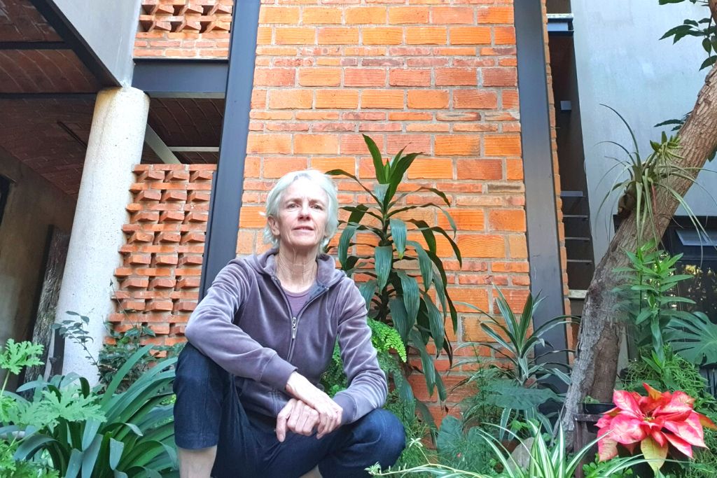 Sue in her garden